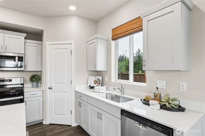 Who doesn't like a window behind your kitchen sink. Photos are for representational purposes only.  Colors and finishes may vary.