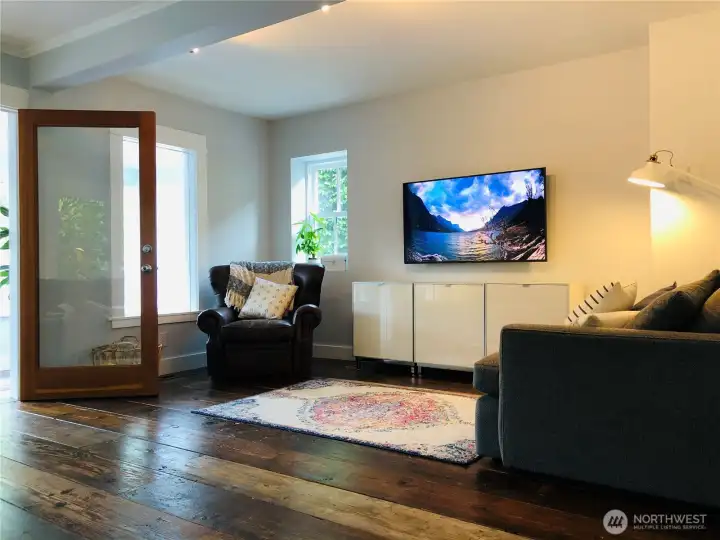 The floors are special. Wide wood planks with a legit patina that is not something that can be mimicked. Combine with walls that host art well and you have "Rough Luxe."