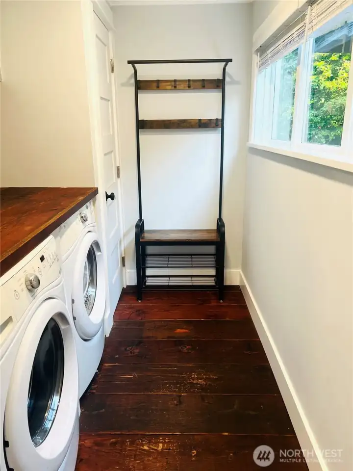 This laundry room is centrally located and everything you need.