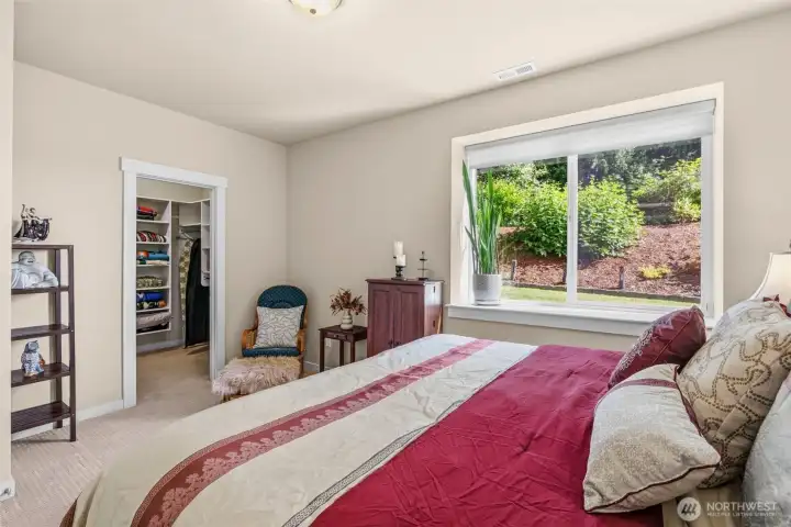 Lower level bedroom with walk in closet.