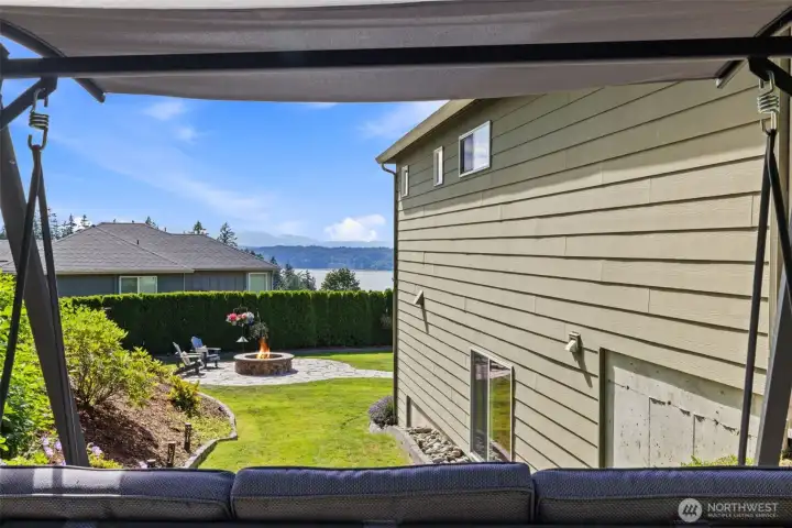 Upper side yard brick paver patio perch to take in the views.