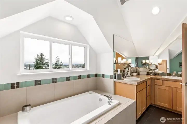 Master suite offers a 5pc bath with soaking tub, dual sinks and walkin shower. Large4 windows way above the neighborhood give loads of light yet offer privacy. Master suite offers a 5pc bath with soaking tub, dual sinks and walkin shower. Large4 windows way above the neighborhood give loads of light yet offer privacy.