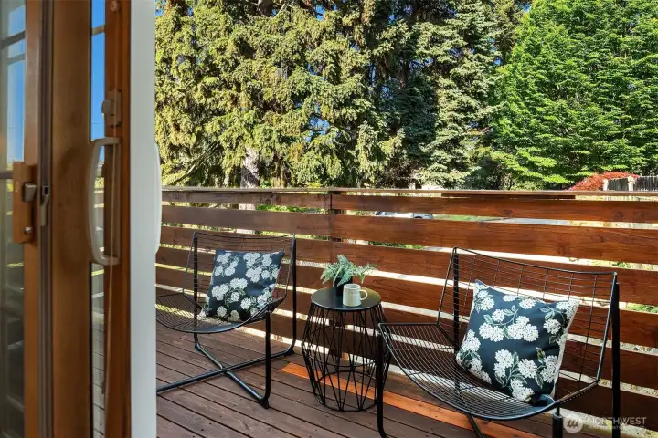 A sweet perch for morning coffee, a quiet read, or watching the neighborhood wake up — this private deck brings the outdoors right to the bedroom.