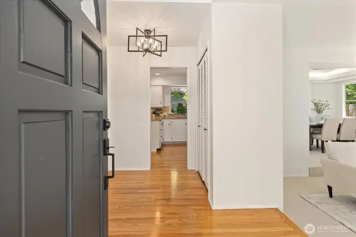 Gleaming Hardwoods and Soaring Ceilings Upon Entry