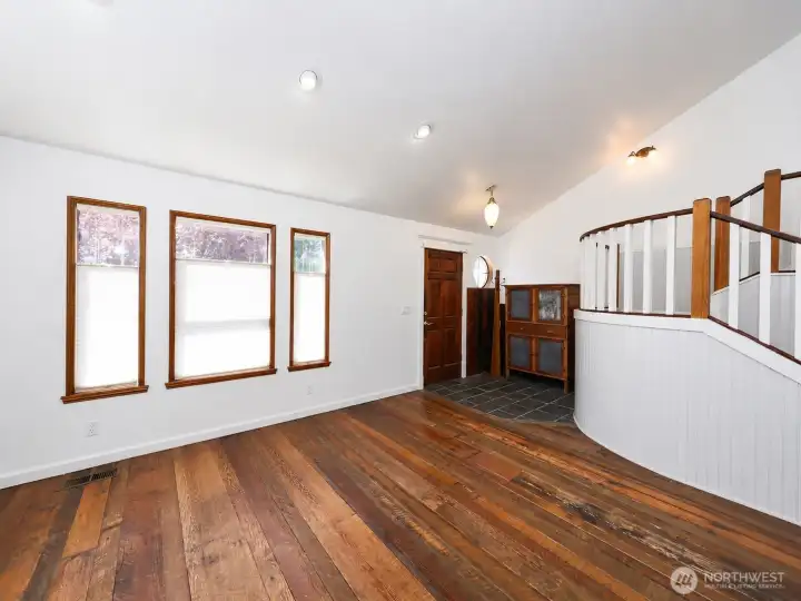 Entry boasts a Striking, Custom,  Worm Wood Accent Wall..