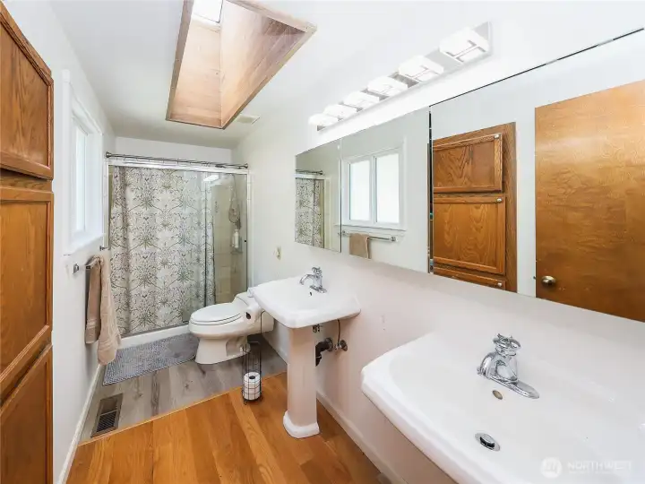 Primary Bath off Bedroom #1..Skylight   and Dual Vanity