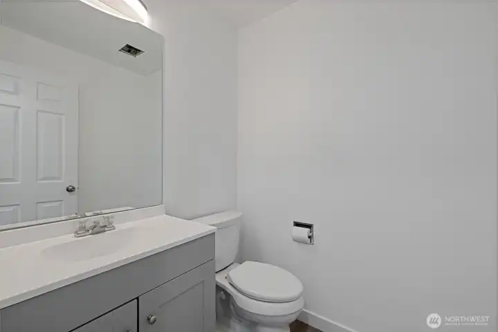 half bath downstairs has a brand new vanity