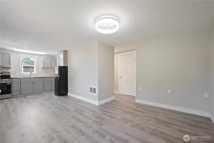 Kitchen with room for table. Love the new floors.