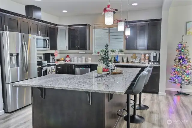 Stunning kitchen features beautiful cabinetry!