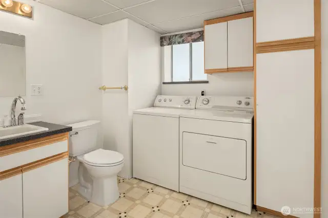 Downstairs 1/2 bathroom and laundry room.