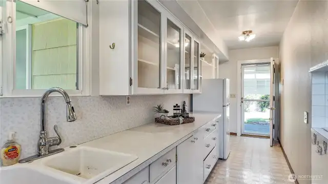 Lots Of Counter Space To Prep Food. Utility Area And Bones Room To The Left Of Door