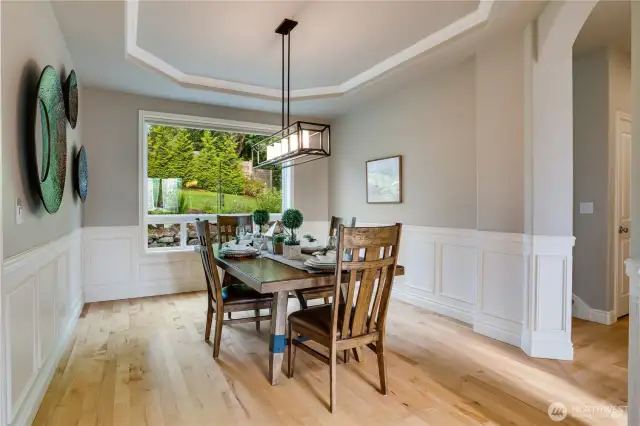 Large window faces the rear yard in the dining room.  This room will allow for the table extensions for gatherings that turn into memories.