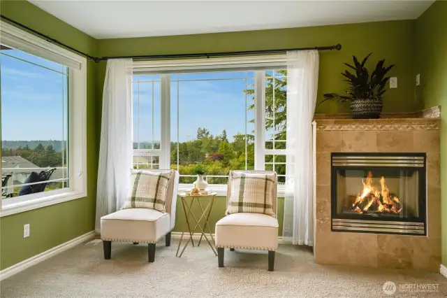 Hope about a chaise here with a sweet accent table beside?