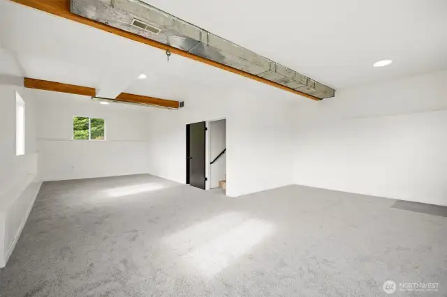 Huge rec room that leads out onto the yard.