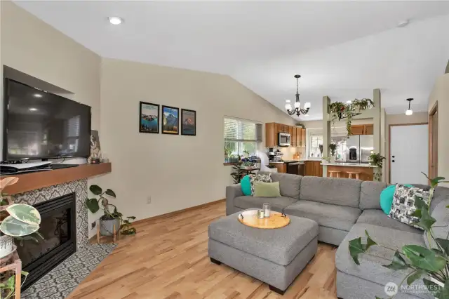 living room with vaulted ceiling