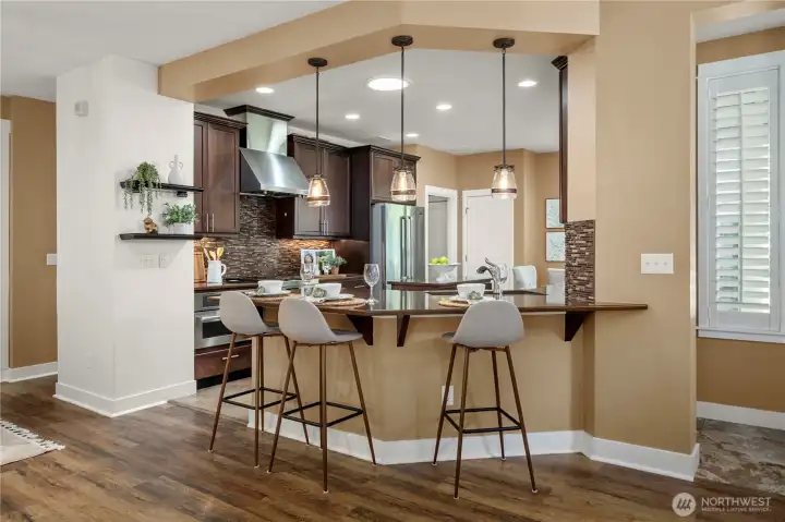 Great bar with beautiful pendant lighting.