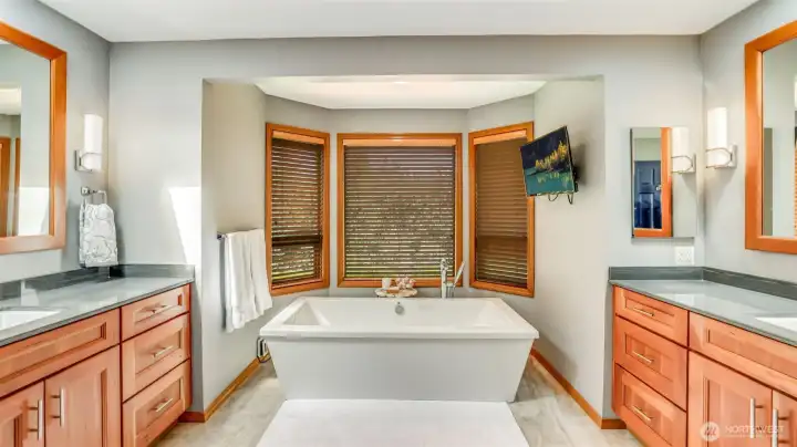 Elegant, spa-inspired retreat featuring heated floors, dual vanities, and a spacious walk-in closet.”    “Luxurious soaking tub with heated back and air jets—perfectly positioned to take in serene backyard views.”    “Beautifully remodeled primary bath with separate vanities, quality finishes, and timeless elegance.”    “Your private oasis—heated flooring, stand-alone soaking tub, and a peaceful garden outlook.”    “A true spa experience at home with thoughtful design, high-end details, and everyday convenience.