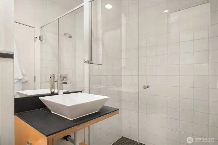 Three quarter bath on the main level, perfect for guests.