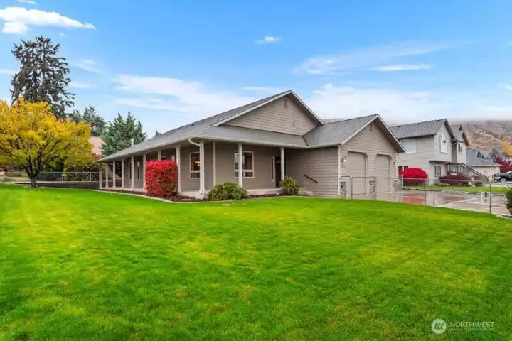 Gorgeous surrounding views of Saddle Rock, Badger Mountain, Rooster Comb, see the city lights at night come out like stars. Home is only 15 mins away from Mission Ridge Ski slopes. This huge (11,761 sq ft) corner lot is perfect for everyone. The wrap around porch is a great hang out spot year around. Come live life on the sunny side of the mountains!