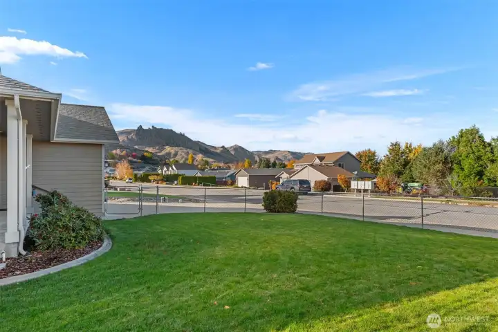 Perfectly located on a large, corner, fully fenced lot close to town and only about 20-25 minutes to Mission Ridge Recreation area! So many outdoor activities close by and plenty of good walking space within the neighborhood.