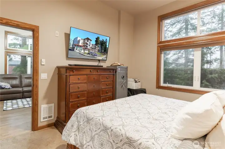 Primary bedroom.  Zone controlled wall heaters.