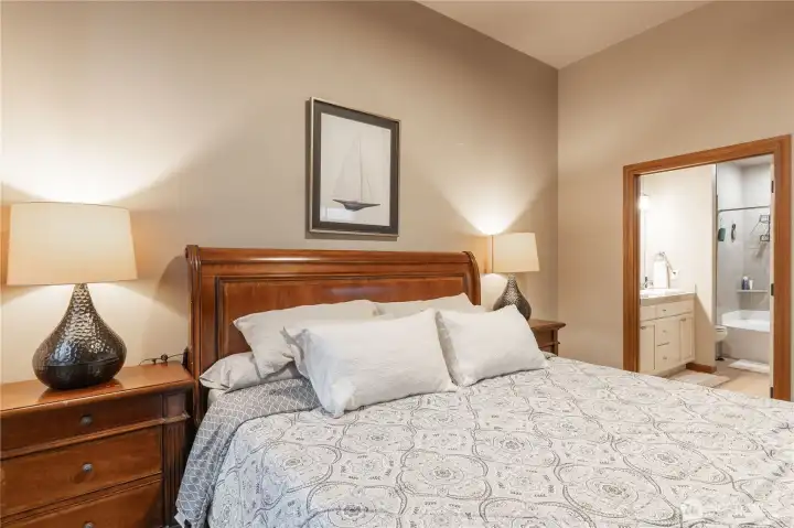 Primary bedroom showing entry to primary full bath.