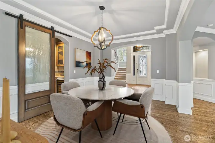 Butlers pantry separates the dining room from the kitchen.