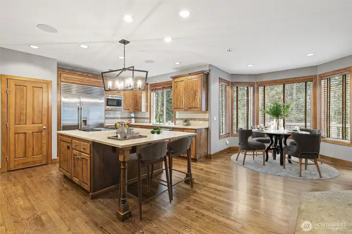 Beautiful hardwood floors and peaceful backyard views.