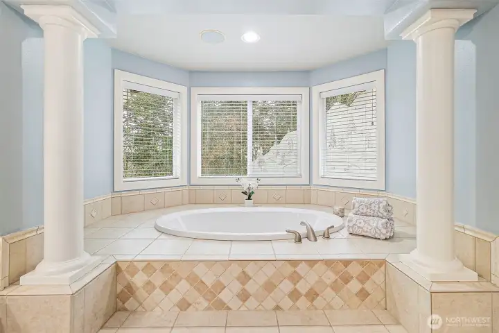Relax at the end of the day in this grand soaking tub.