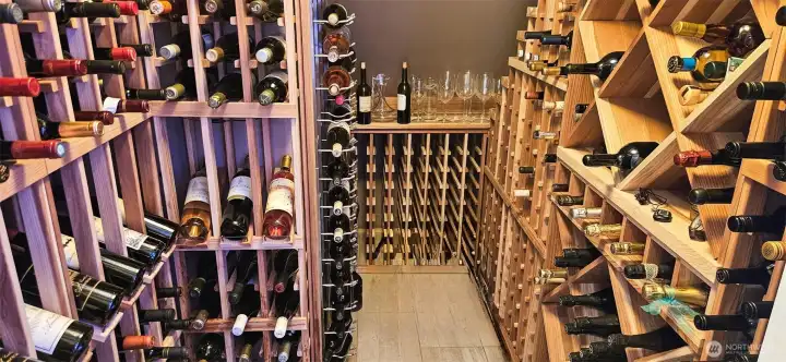 Wine room has plenty of display and storage space.