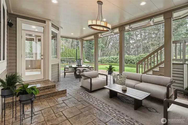 Covered patio with built-in gas heaters can be used year round.