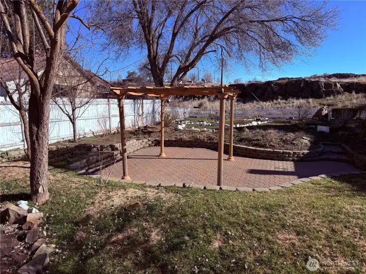 Fruit trees and Loads of Perennials in the beds make for a gorgeous blooming season!