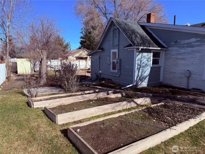 Basement has insulation and poured concrete flooring. Great for a canning space/storage or make it a wine cellar!