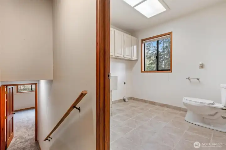 1/2 bath and laundry room on main