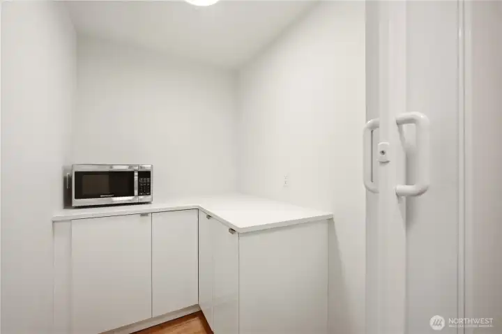 Huge pantry / flex space across from kitchen.