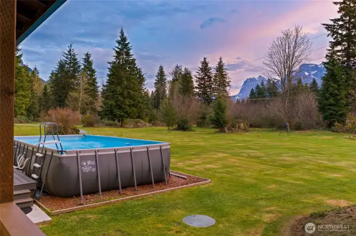 Enjoy the Cascade Mountains from your pool.