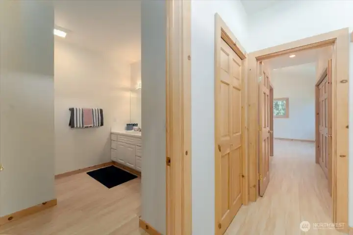 Guest Bath adjacent to formal living room and hallway leading to primary  Lots of storage