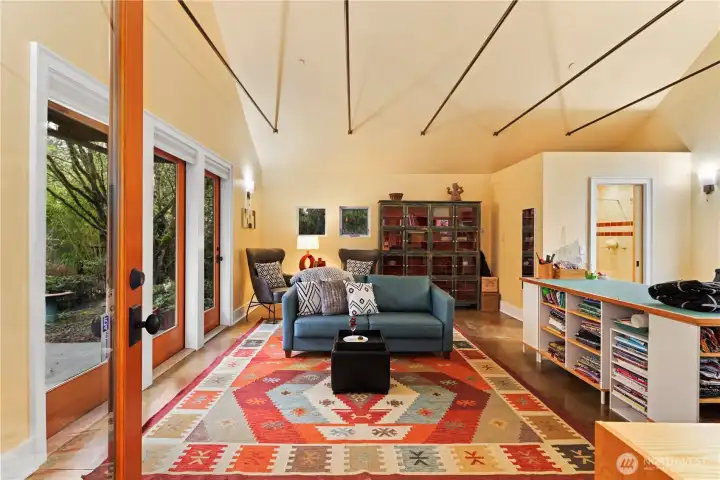 Vaulted ceilings make this a beautifully light, airy room for an extra bedroom, crafts, office ...