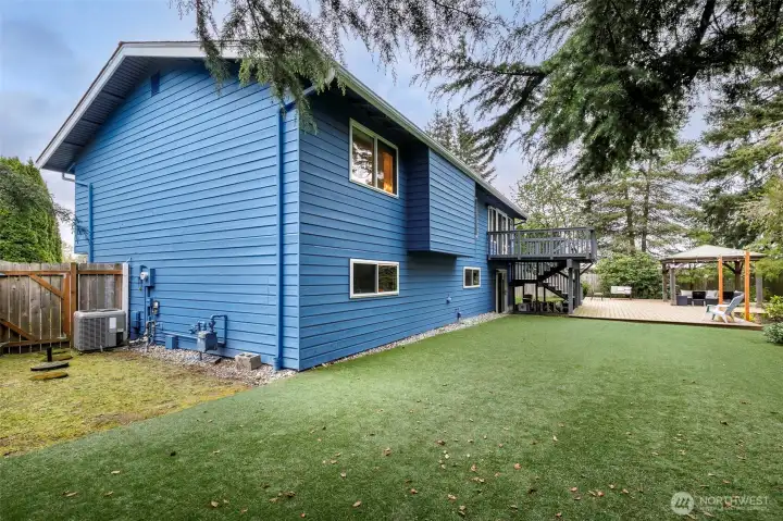 Back yard level private and fenced. Turf for low maintenance and all year green.