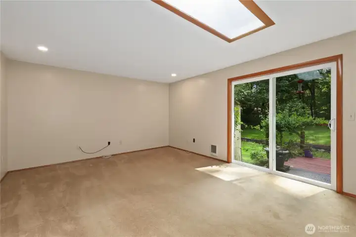 The deck is located directly off the family room The deck is located directly off the family room