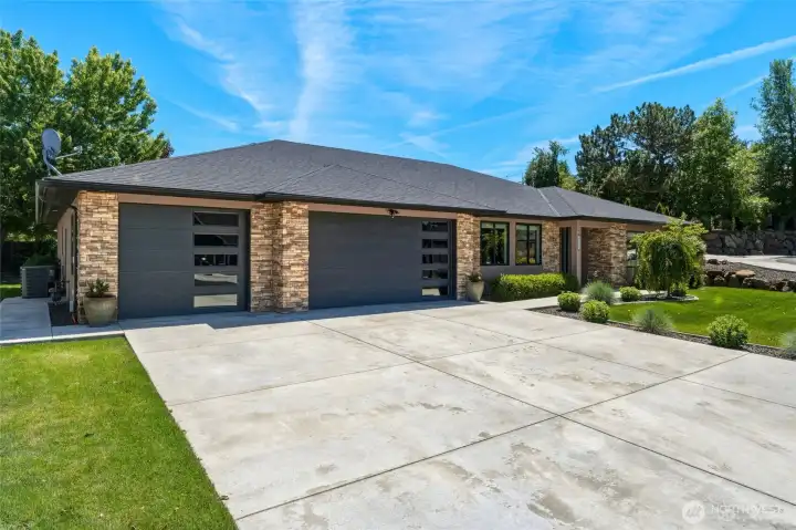Three Car Garage with Paved Driveway Three Car Garage with Paved Driveway