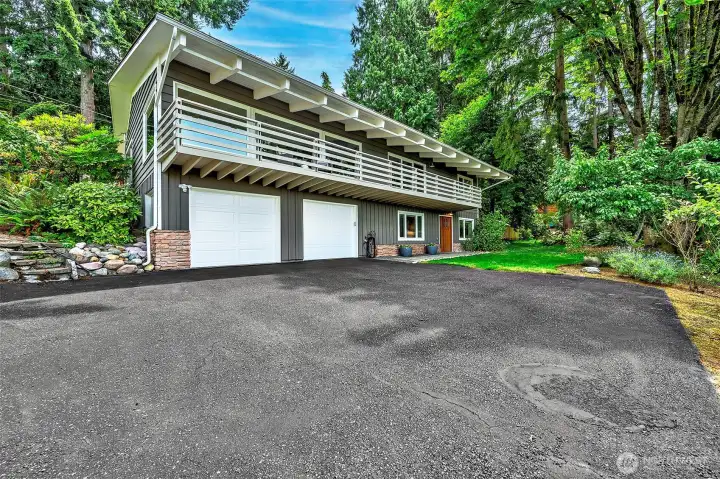 Meticulously maintained inside and out. Two car garage and RV Parking.