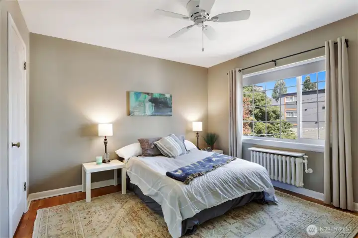 Spacious bedroom with large window