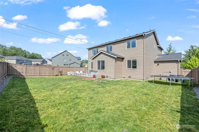 Large fenced-in backyard for play and entertaining!