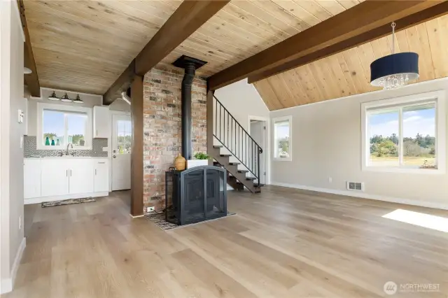 Completely renovated inside with new flooring, paint, doors, trim, lighting, fireplace tile, heaters.