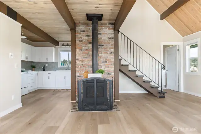 Propane stove heats the whole house in minutes.  Beautiful pine ceilings.