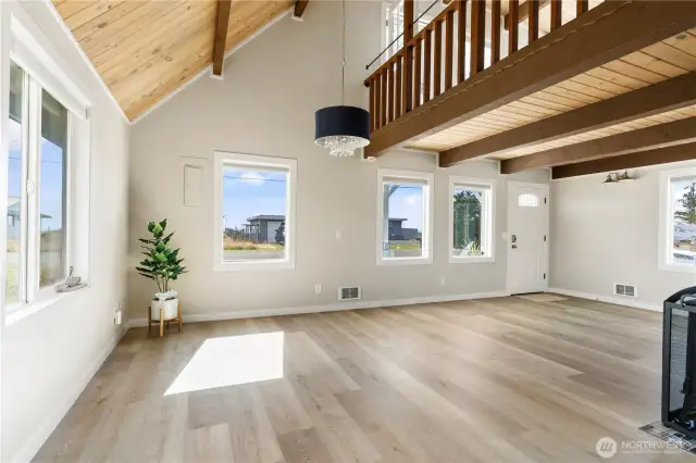 Vaulted pine ceilings are very dramatic.  the loft upstairs is the sleeping quarters