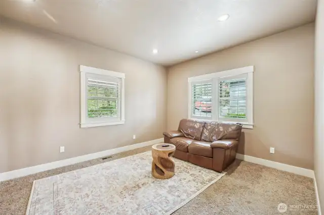 Bonus room on the main floor can be used as a TV room, theatre room, the perfect extra space!