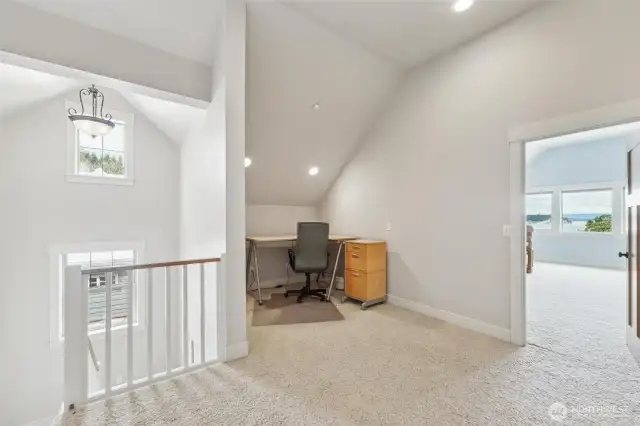 Upstairs has a large loft area that can be used as office space.