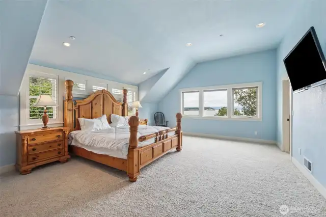 Super-sized primary bedrooms has views of Port Susan and the Cascade Mountains, including Mt Baker.  Imagine waking up to that view every morning!